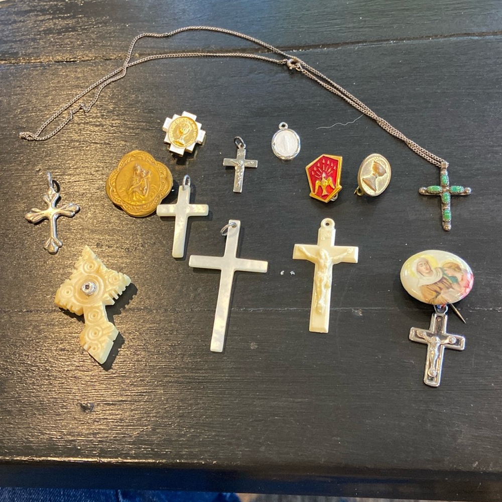 Collection of crosses and pins.   First Holy Communion and Confirmation.